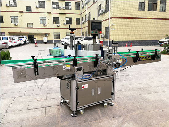 星火圓瓶自動定位貼標(biāo)機展示